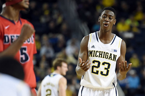 Spike Albrecht (2) and Caris LeVert (23)