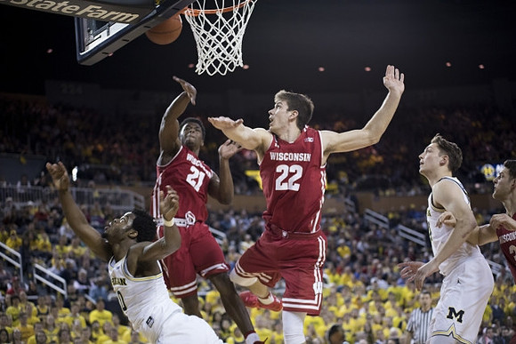 Derrick Walton Jr. (10) and Mark Donnal (34)