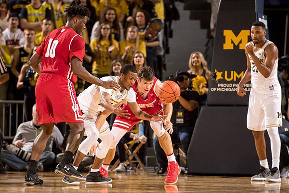 Muhammad-Ali Abdur-Rahkman (12) and Zak Irvin (21)