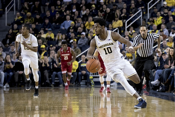 Muhammad-Ali Abdur-Rahkman (12) and Derrick Walton Jr. (10)