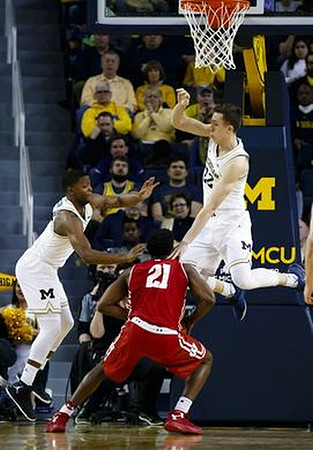 Xavier Simpson (3) and Duncan Robinson (22)