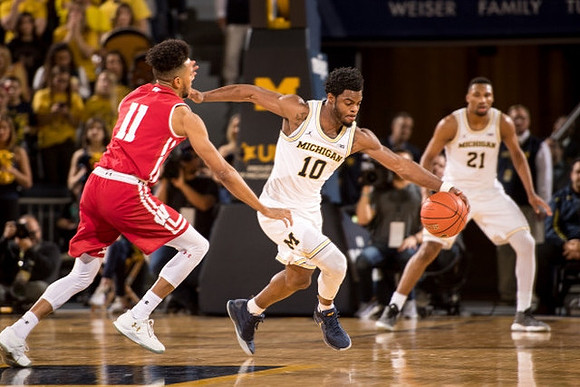 Derrick Walton Jr. (10) and Zak Irvin (21)