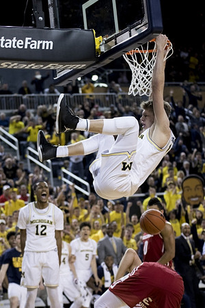 Muhammad-Ali Abdur-Rahkman (12) and Moritz Wagner (13)