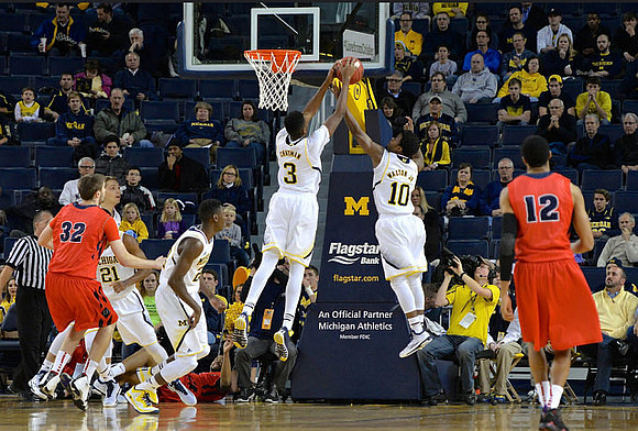 Zak Irvin (21), Caris LeVert (23), Kameron Chatman (3), and Derrick Walton Jr. (10)
