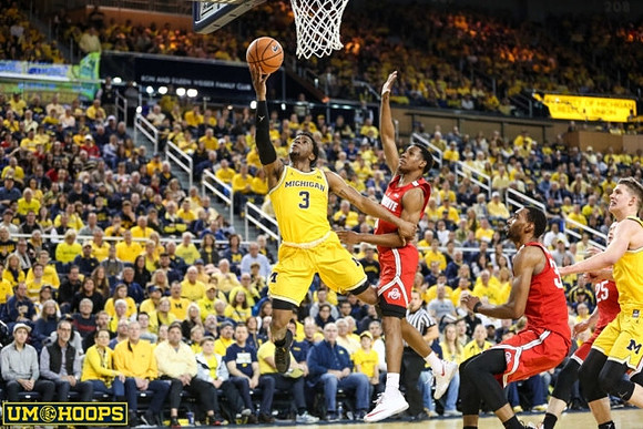 Zavier Simpson (3) and Moritz Wagner (13)
