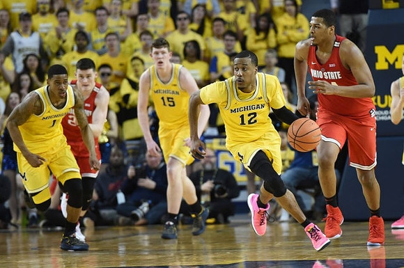 Charles Matthews (1), Jon Teske (15), and Muhammad-Ali Abdur-Rahkman (12)