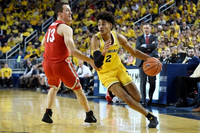 Jordan Poole (2) and Ohio State Head Coach Chris Holtmann