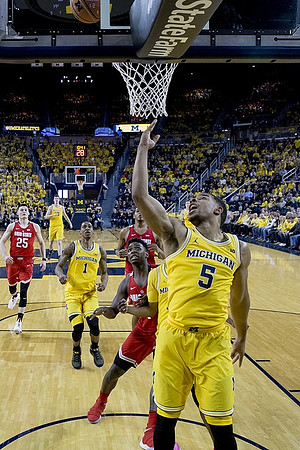 Jaaron Simmons (5), Charles Matthews (1), and Jon Teske (15)