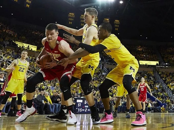 Duncan Robinson (22), Moritz Wagner (13), and Muhammad-Ali Abdur-Rahkman (12)