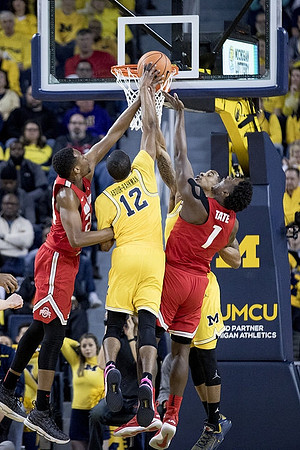 Muhammad-Ali Abdur-Rahkman (12) and Jaaron Simmons (5)
