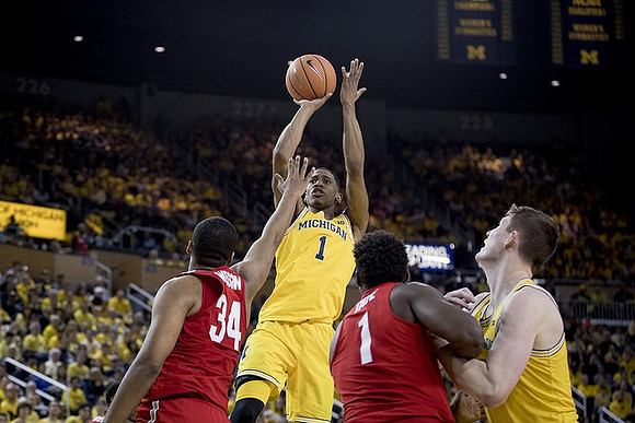Charles Matthews (1) and Jon Teske (15)