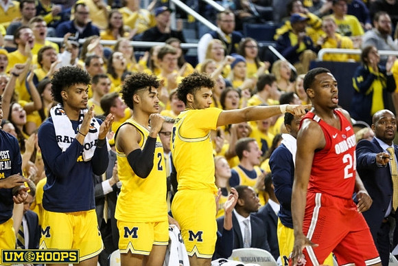 Ibi Watson (23), Jordan Poole (2), Isaiah Livers (4), and Deandre Haynes