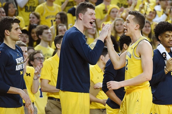 Austin Hatch (30), Jaaron Simmons (5), Duncan Robinson (22), and Ibi Watson (23)
