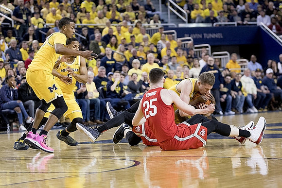 Muhammad-Ali Abdur-Rahkman (12), Jaaron Simmons (5), and Moritz Wagner (13)