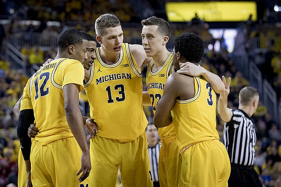 Muhammad-Ali Abdur-Rahkman (12), Charles Matthews (1), Moritz Wagner (13), Duncan Robinson (22), and Zavier Simpson (3)