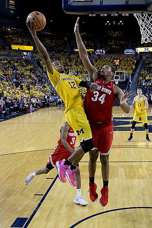 Muhammad-Ali Abdur-Rahkman (12) and Moritz Wagner (13)