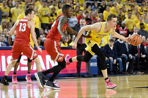 Muhammad-Ali Abdur-Rahkman (12) and Duncan Robinson (22)