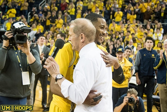 Muhammad-Ali Abdur-Rahkman (12) and John Beilein