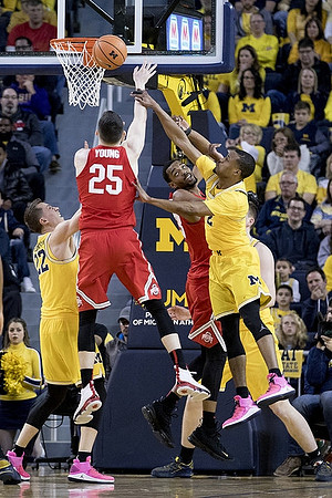 Duncan Robinson (22) and Muhammad-Ali Abdur-Rahkman (12)