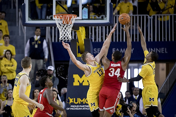 Duncan Robinson (22), Moritz Wagner (13), and Muhammad-Ali Abdur-Rahkman (12)