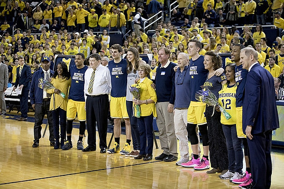 Jaaron Simmons (5), Austin Hatch (30), Duncan Robinson (22), Muhammad-Ali Abdur-Rahkman (12), and John Beilein
