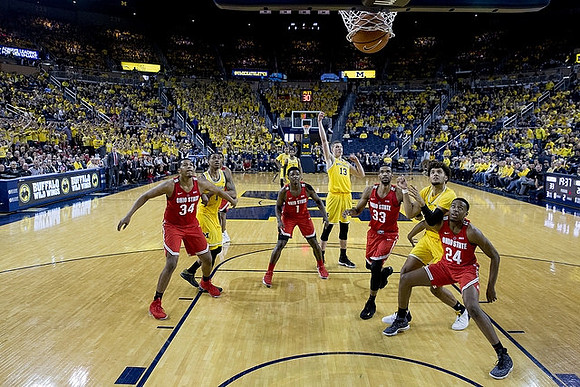 Charles Matthews (1), Moritz Wagner (13), and Isaiah Livers (4)