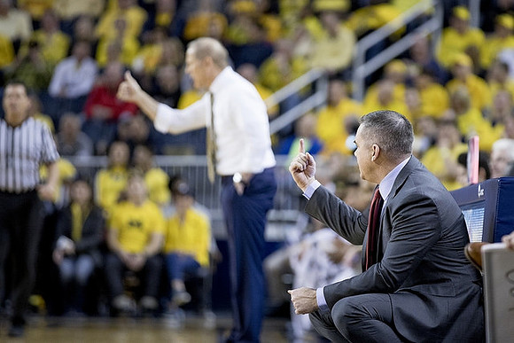 Ohio State Head Coach Chris Holtmann and John Beilein