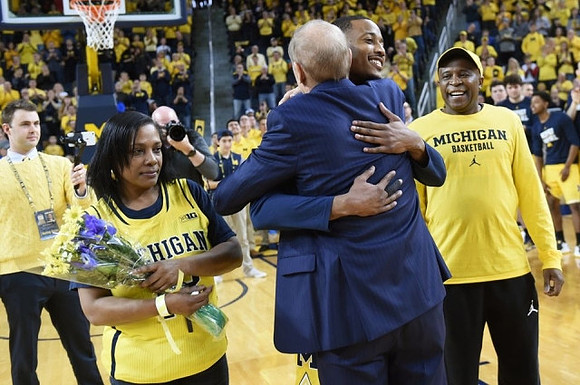 Muhammad-Ali Abdur-Rahkman (12) and John Beilein