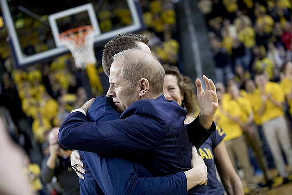 Duncan Robinson (22) and John Beilein
