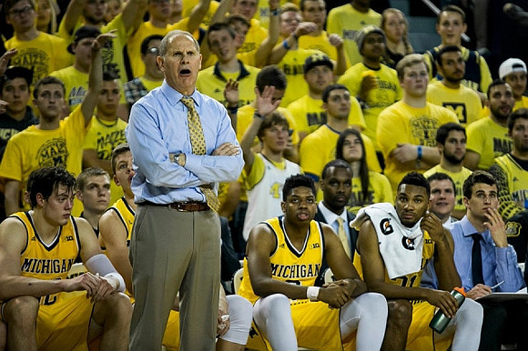 Ricky Doyle (32), Moritz Wagner (13), John Beilein, Kameron Chatman (3), and Zak Irvin (21)