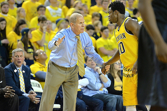 Jeff Meyer, John Beilein, and Derrick Walton Jr. (10)
