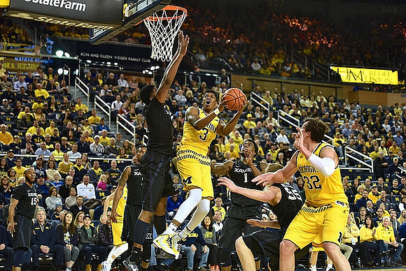 Kameron Chatman (3) and Ricky Doyle (32)