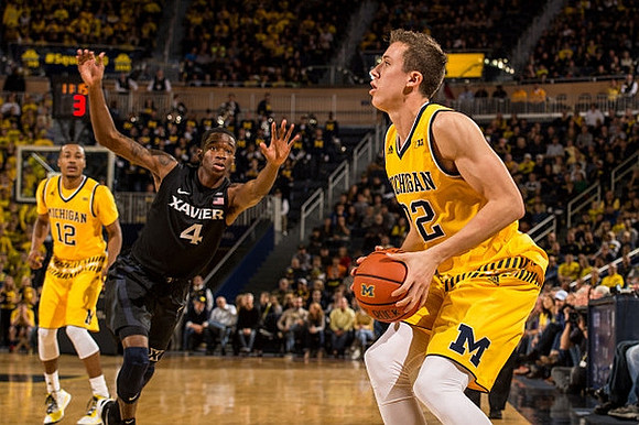 Muhammad-Ali Abdur-Rahkman (12) and Duncan Robinson (22)