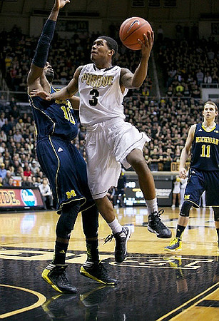 Tim Hardaway Jr. (10) and Nik Stauskas (11)
