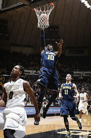 Tim Hardaway Jr. (10) and Nik Stauskas (11)