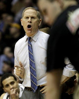 Jordan Morgan (52) and John Beilein