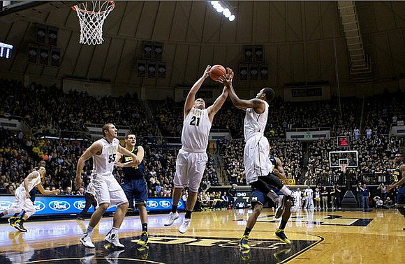 Jordan Morgan (52) and Tim Hardaway Jr. (10)