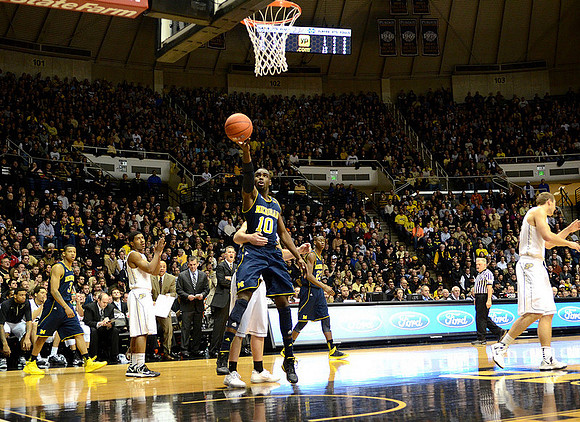 Trey Burke (3), Tim Hardaway Jr. (10), and Caris LeVert (23)