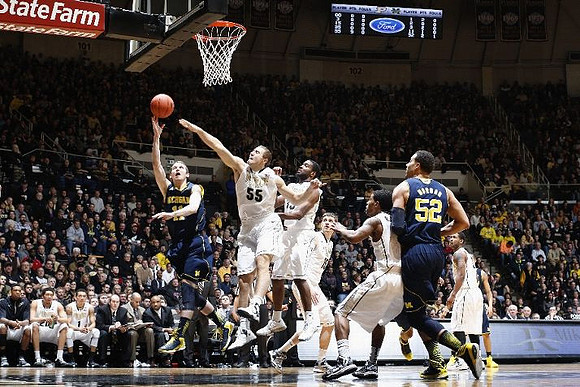 Nik Stauskas (11) and Jordan Morgan (52)