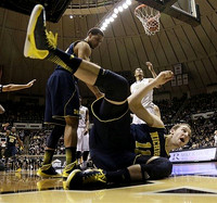 Jordan Morgan (52) and Nik Stauskas (11)