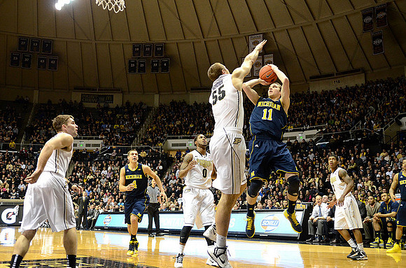 Mitch McGary (4) and Nik Stauskas (11)