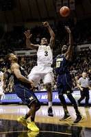 Trey Burke (3) and Tim Hardaway Jr. (10)