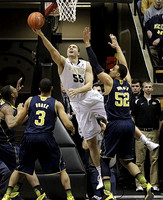 Glenn Robinson III (1), Trey Burke (3), and Jordan Morgan (52)