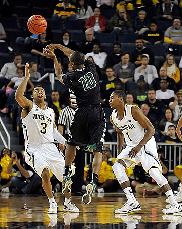 Trey Burke (3) and Glenn Robinson III (1)