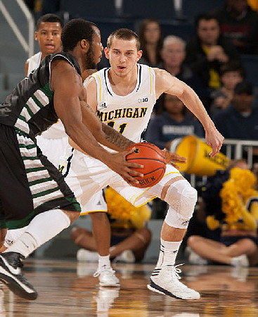Trey Burke (3) and Nik Stauskas (11)