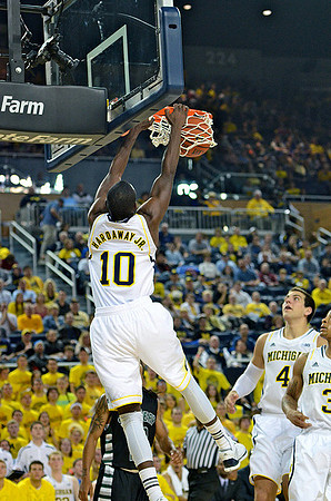 Tim Hardaway Jr. (10), Mitch McGary (4), and Trey Burke (3)