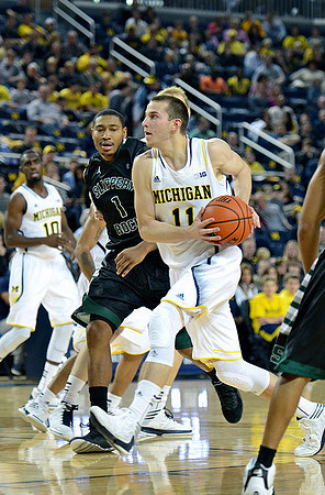 Tim Hardaway Jr. (10) and Nik Stauskas (11)