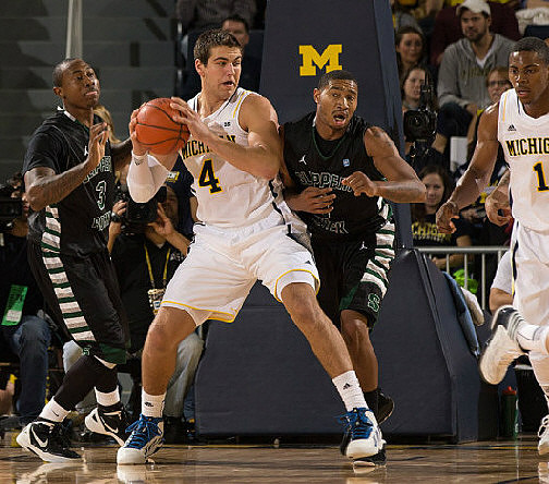 Mitch McGary (4) and Glenn Robinson III (1)