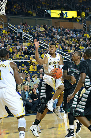 Glenn Robinson III (1) and Trey Burke (3)