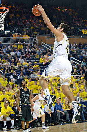 Mitch McGary (4) and Spike Albrecht (2)